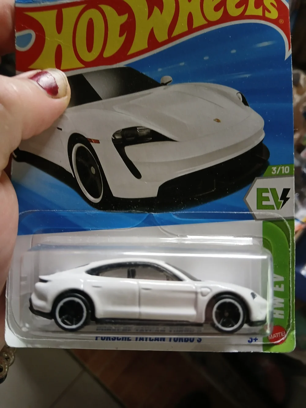 white Hot Wheels Porsche Taycan Turbo S from the 2026 HW EV series (3/10, number
